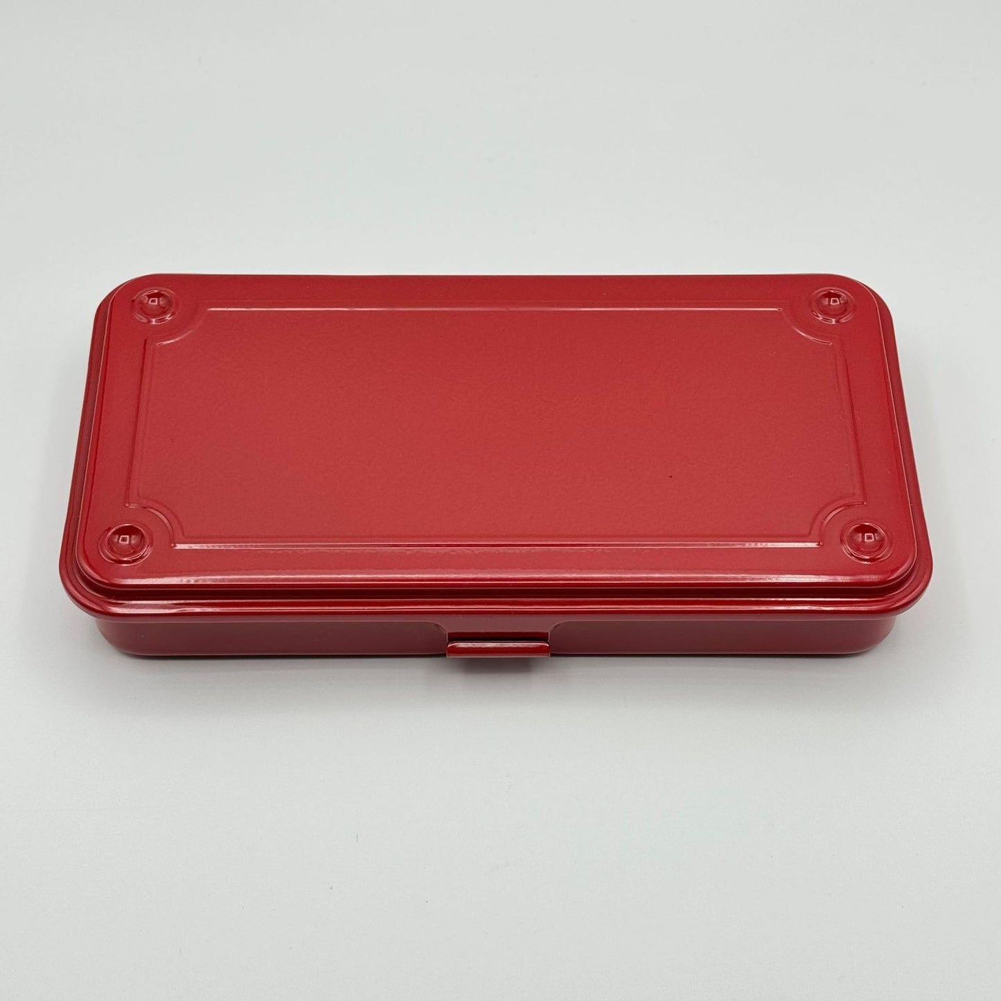 A slim red toolbox from the Pencil Me In stationery shop.