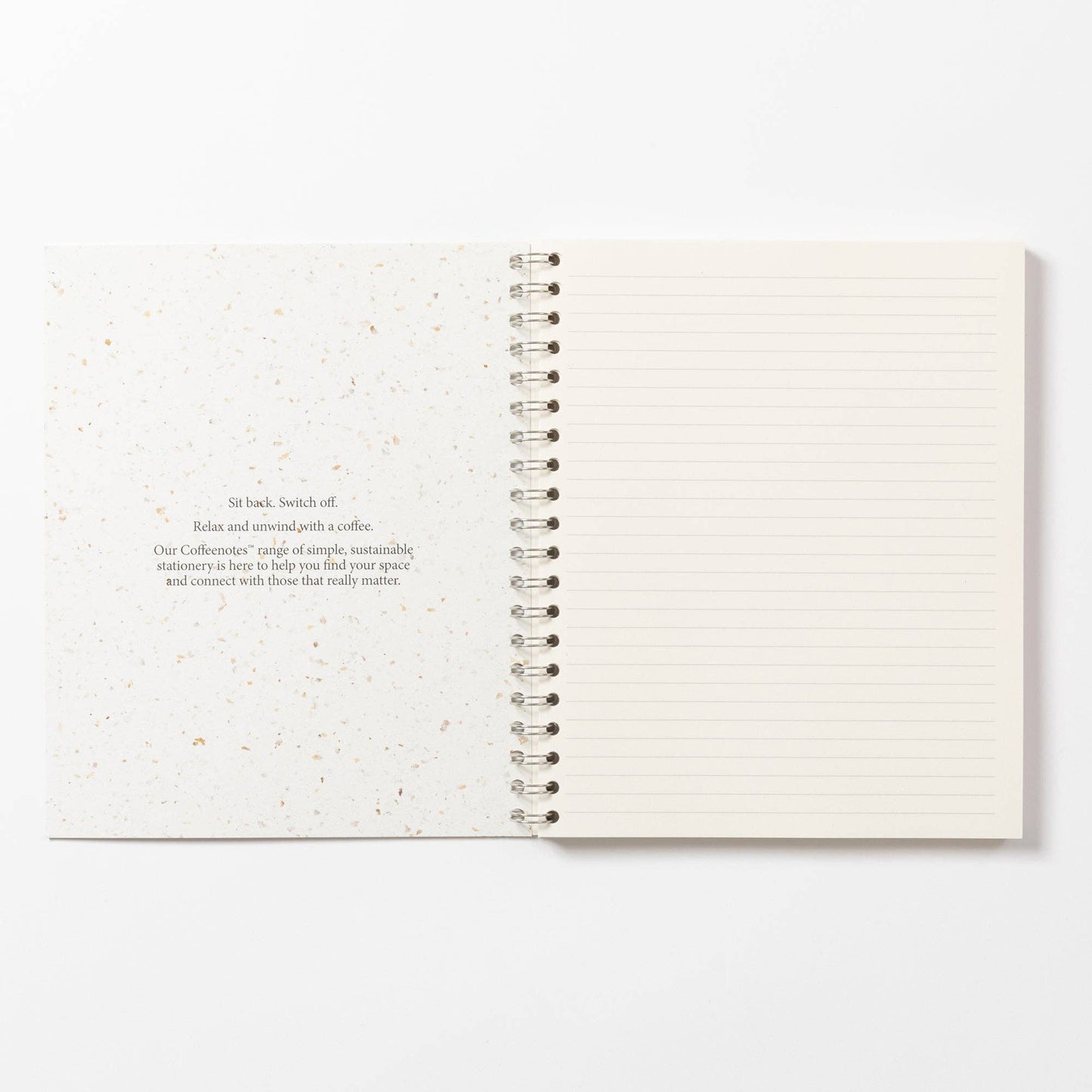 An A5 notebook with coffee grounds cover from the Pencil Me In stationery shop.