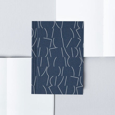 Navy with white line design cover A6 notebook from the Pencil Me In stationery shop.
