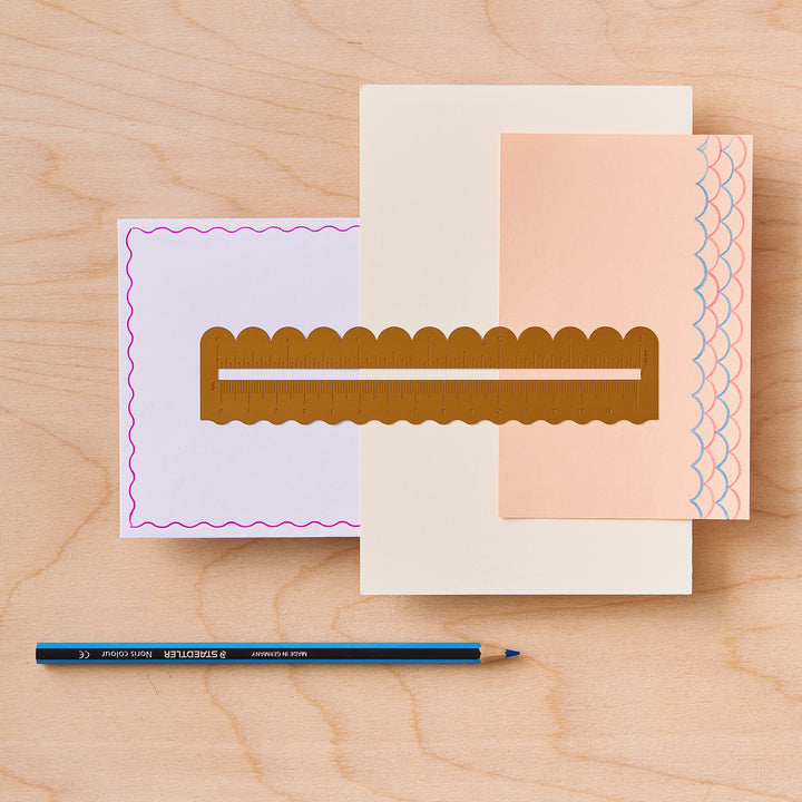 A wavy brass ruler from the Pencil Me In stationery shop.