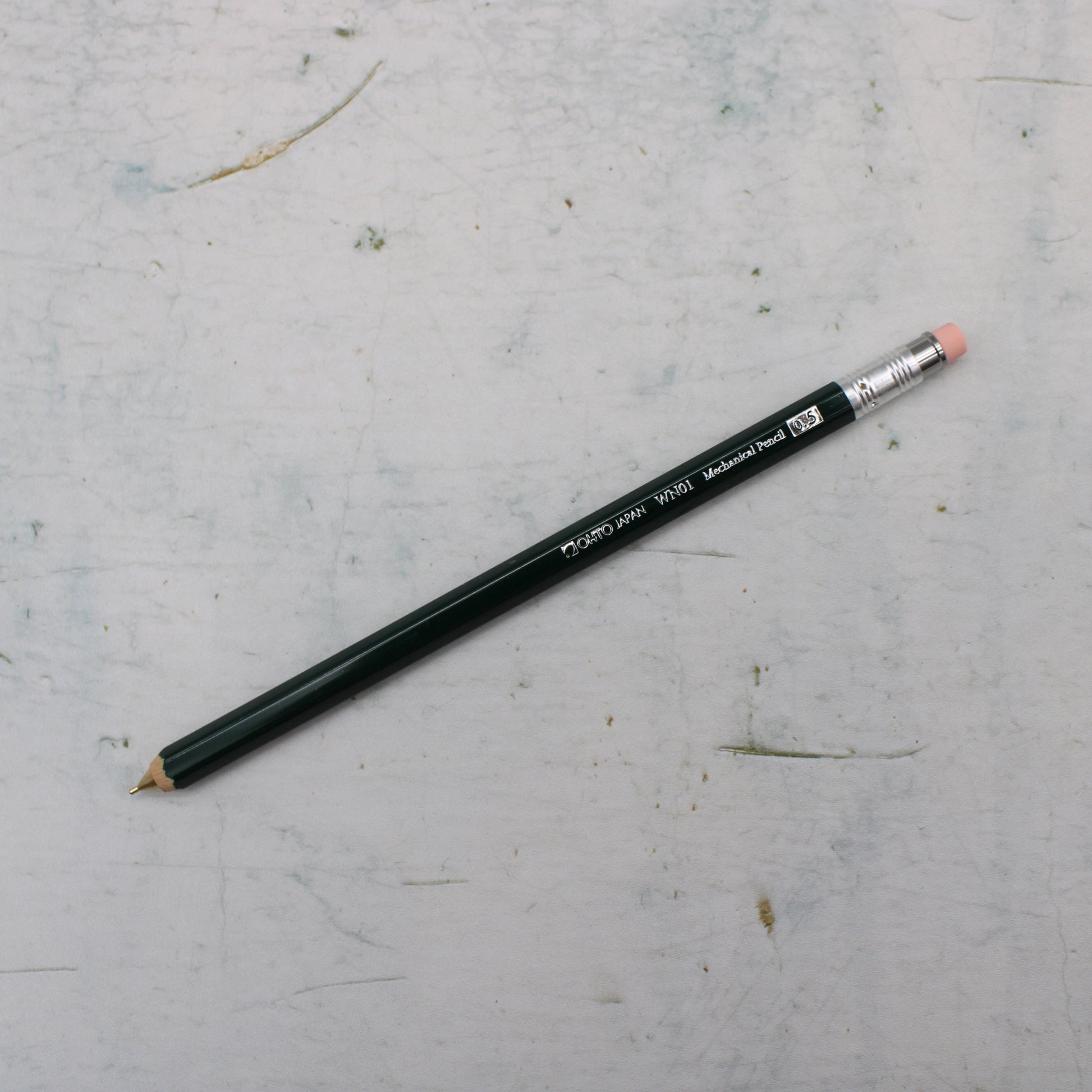 A Green wooden mechanical pencil from the Pencil Me In stationery shop.