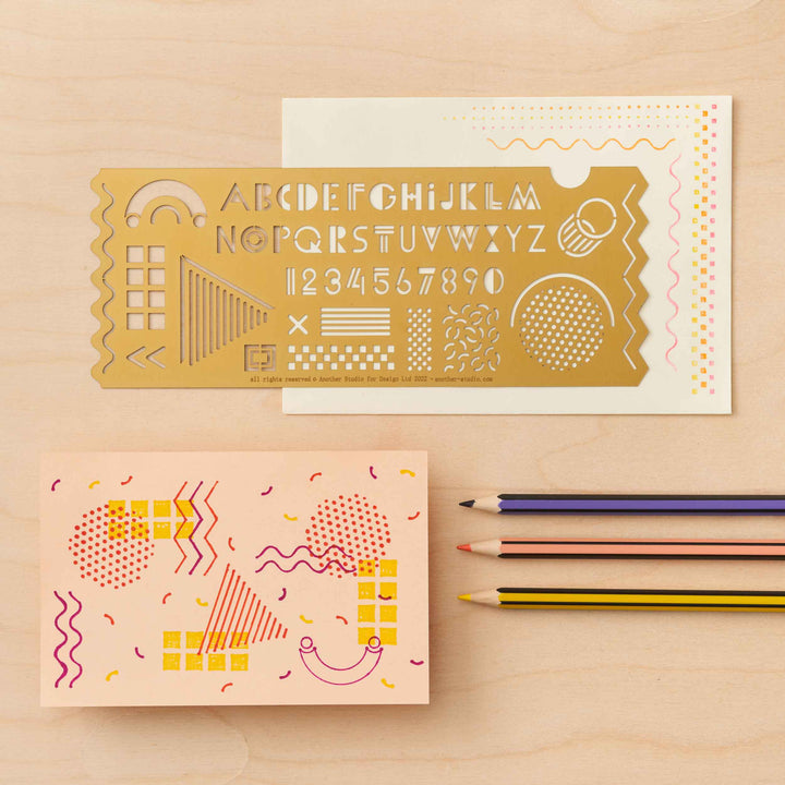 A decorative letter and number stencil from the Pencil Me In stationery shop.