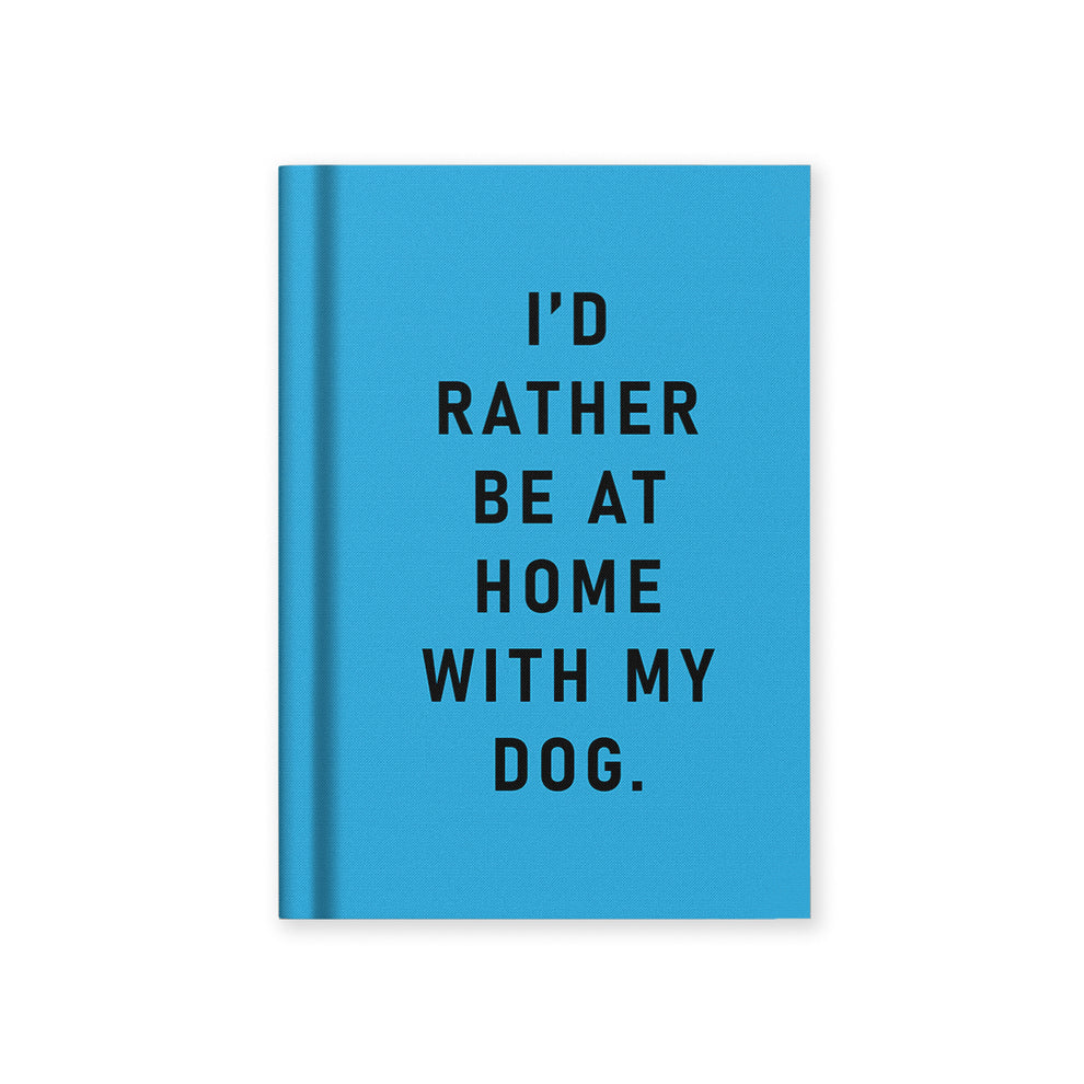 A Blue notebook with text 'I'd rather be at home with my dog' from the Pencil Me In stationery shop.