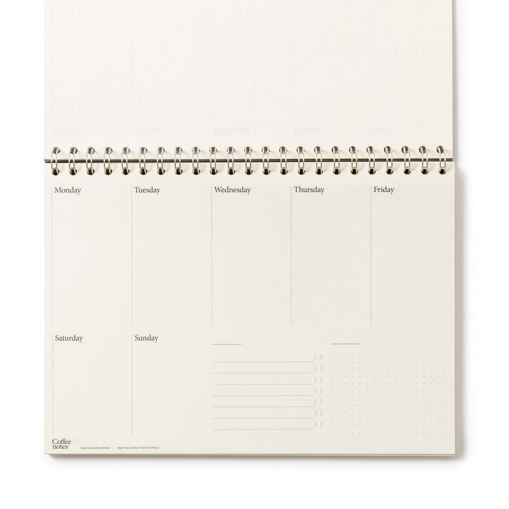 A deep blue weekly planner from the Pencil Me In stationery shop.