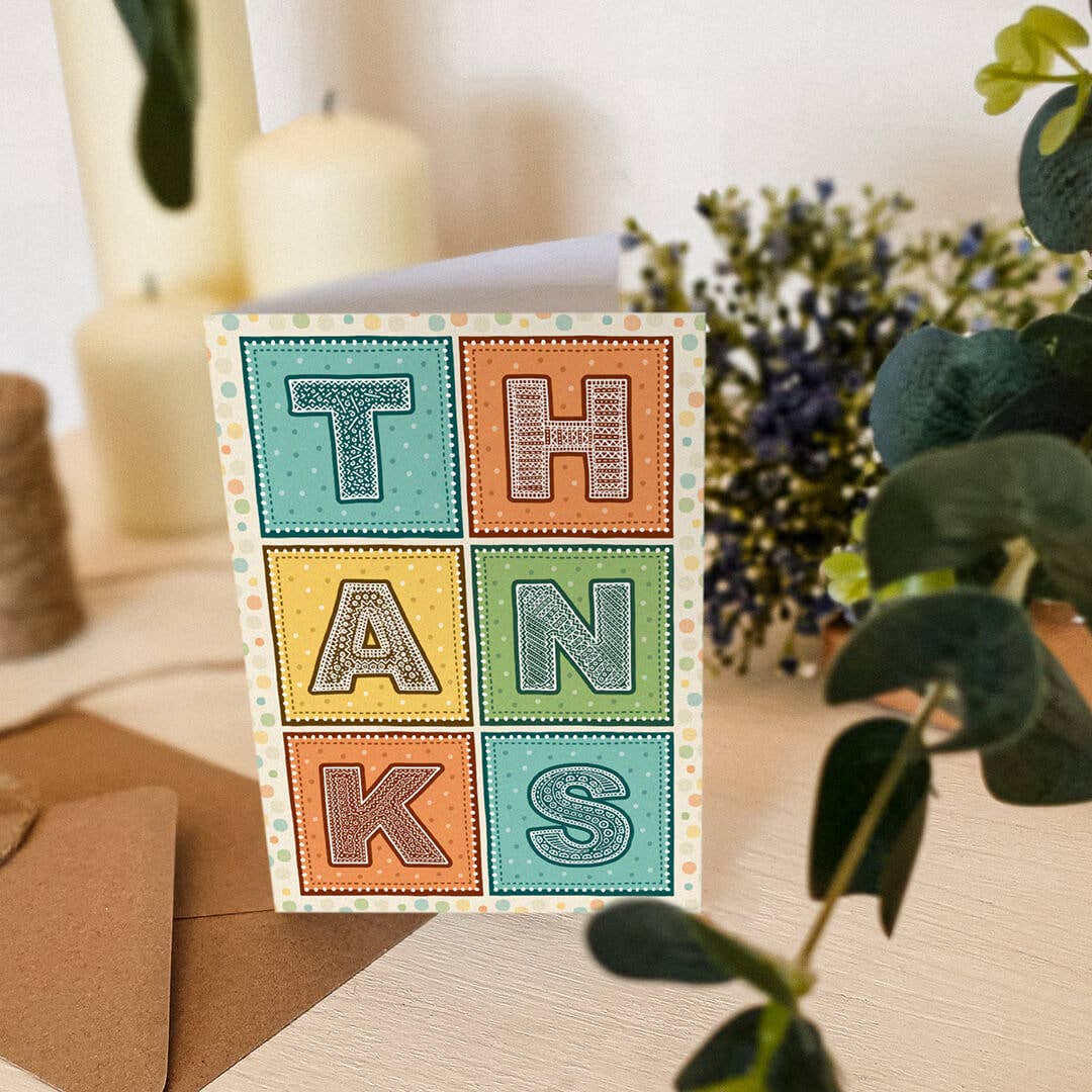Turquoise Orange and Yellow Typographic Thank You Card
