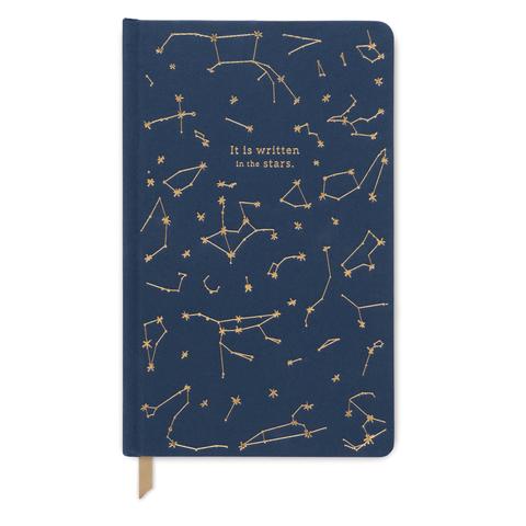 Navy cloth covered journal with gold foil stars on the cover from the Pencil Me In stationery shop