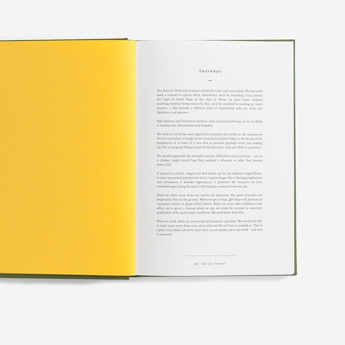 An open book with yellow pages and white text on a white background from the Pencil Me In stationery shop. 