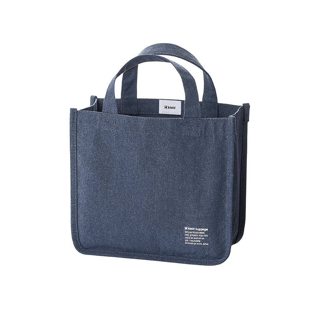 A Navy blue tool tote from the Pencil Me In stationery shop. 