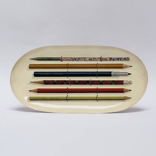 An enamel tray from the Pencil Me In stationery shop. 
