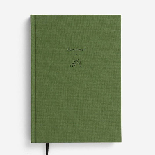 A green hardback linen bound notebook with Journeys on the front cover from the Pencil Me In stationery shop. 