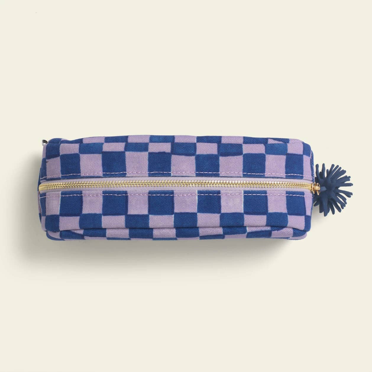 A purple checkerboard pencil case from the Pencil Me In stationery shop. 