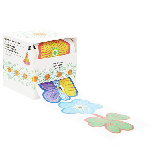A Colorful box of flower-shaped stickers from the Pencil Me In stationery shop. 