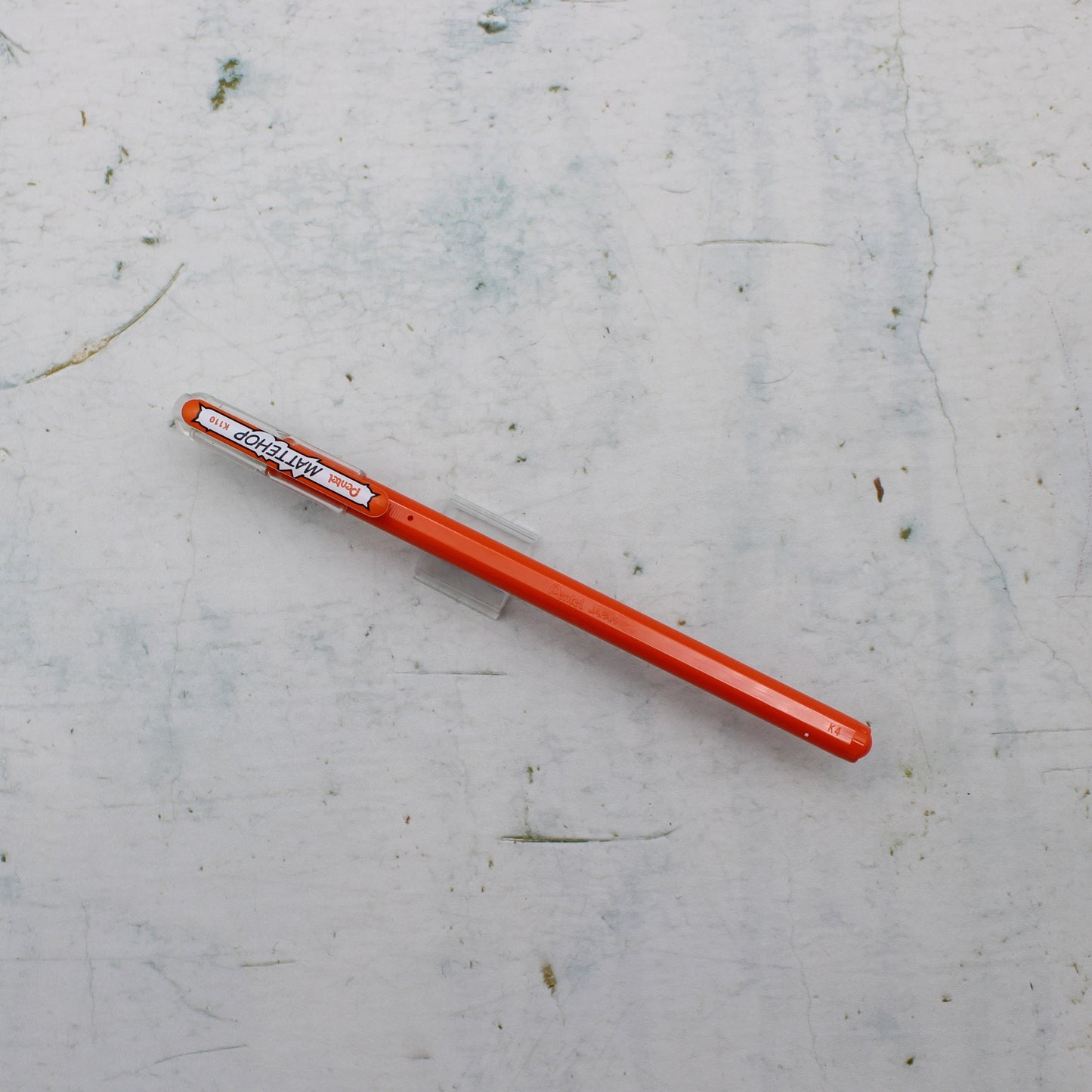 A orange pentel mattehop pen from the Pencil Me In stationery shop.
