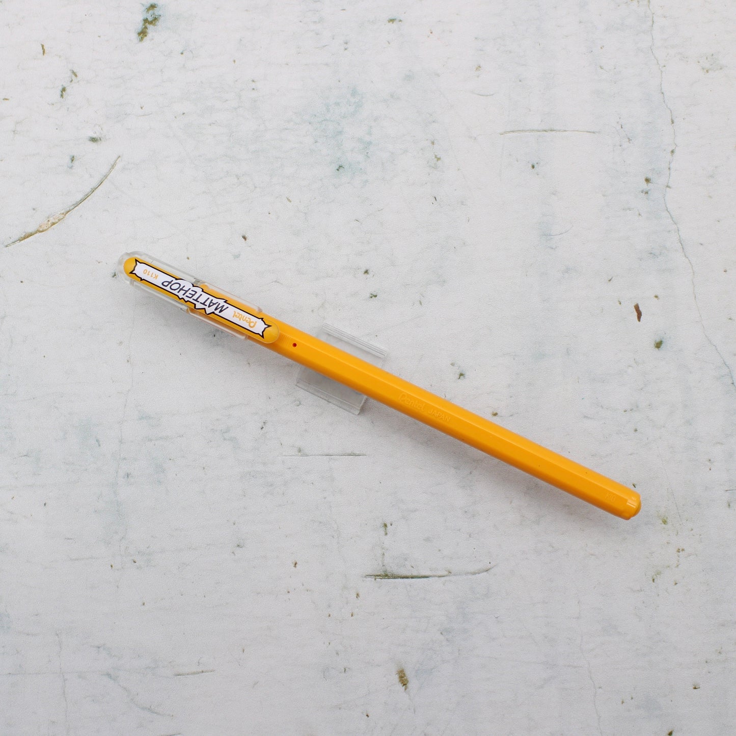 A light orange pentel mattehop pen from the Pencil Me In stationery shop.