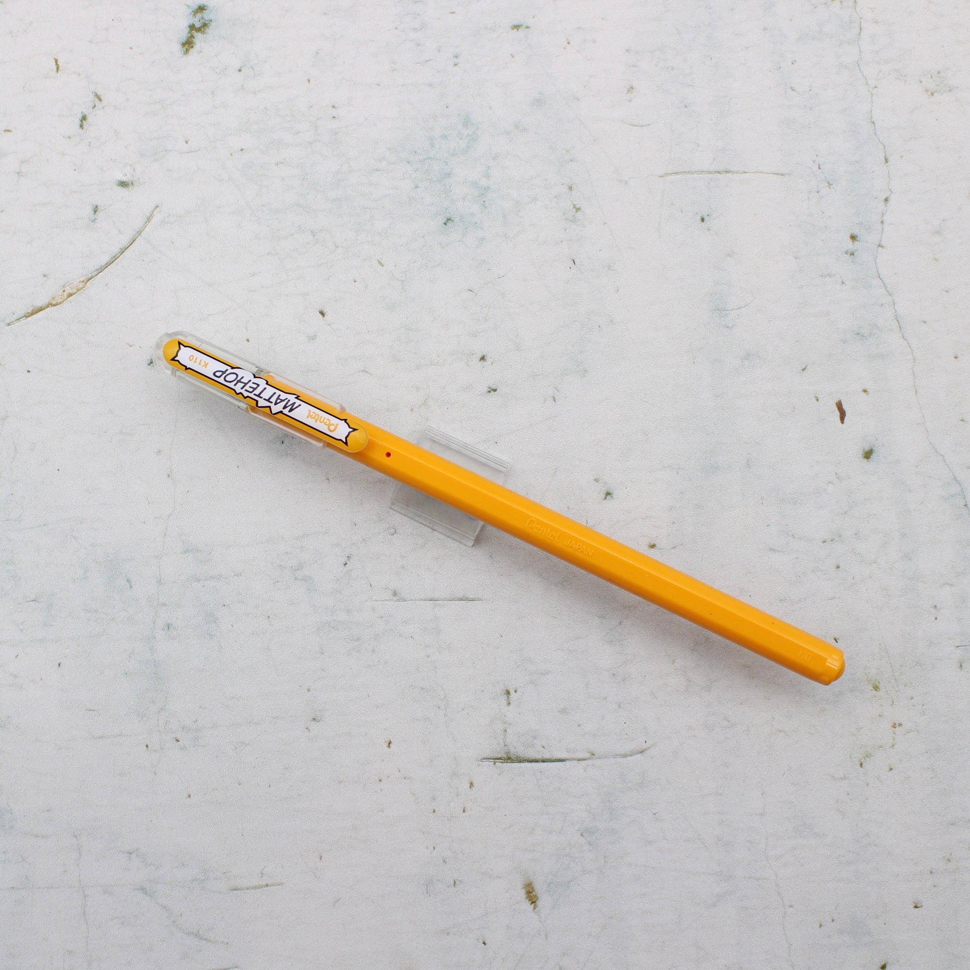 A light orange pentel mattehop pen from the Pencil Me In stationery shop.