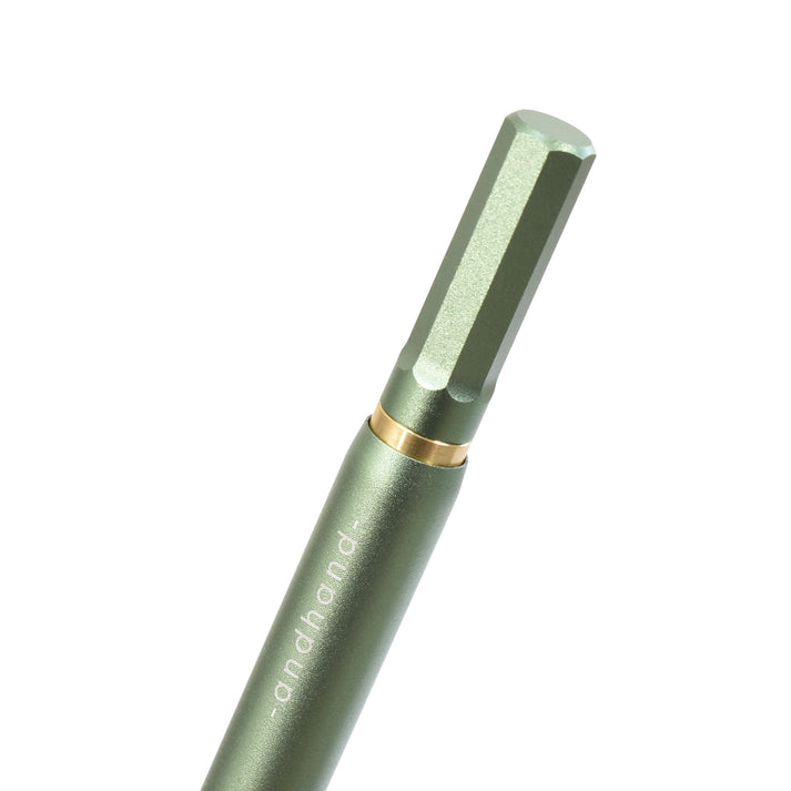 A Green pen with gold accents available from the Pencil Me In stationery shop.