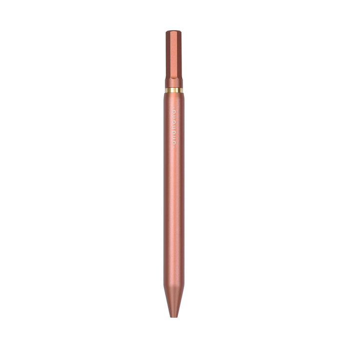 A terracotta red pen available from the Pencil Me In stationery shop.
