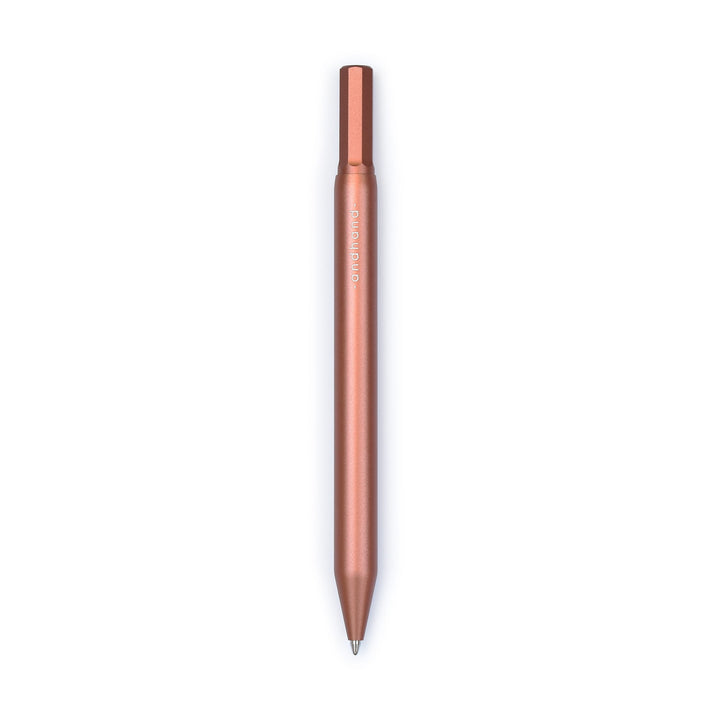 A terracotta red pen available from the Pencil Me In stationery shop.