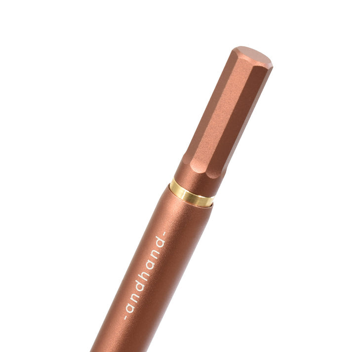 A terracotta red pen available from the Pencil Me In stationery shop.