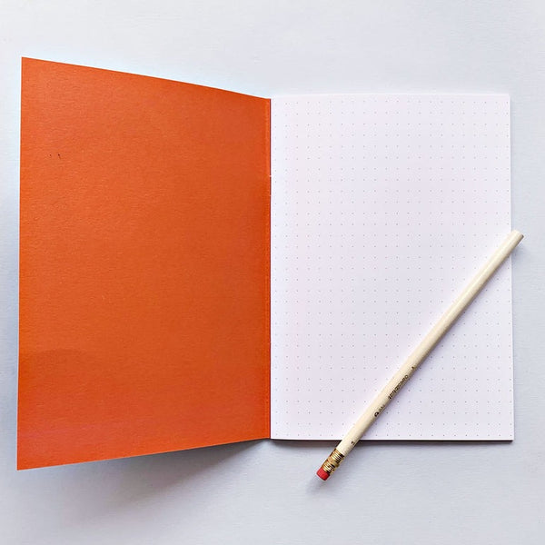 A dot grid notebook from the Pencil Me In stationery shop.