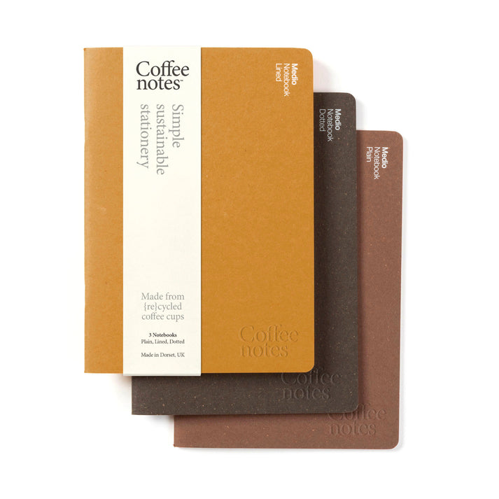 A selection of 3 pocket notebooks in yellow, brown and rust from the Pencil Me In stationery shop. 
