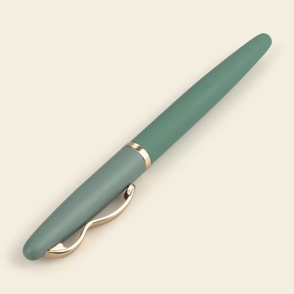 A green rollerball pen from the Pencil Me In stationery shop.