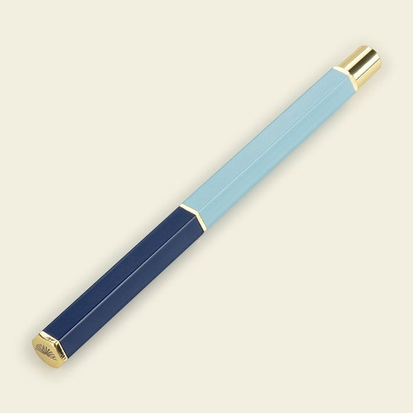 A blue rollerball pen from the Pencil Me In stationery shop.