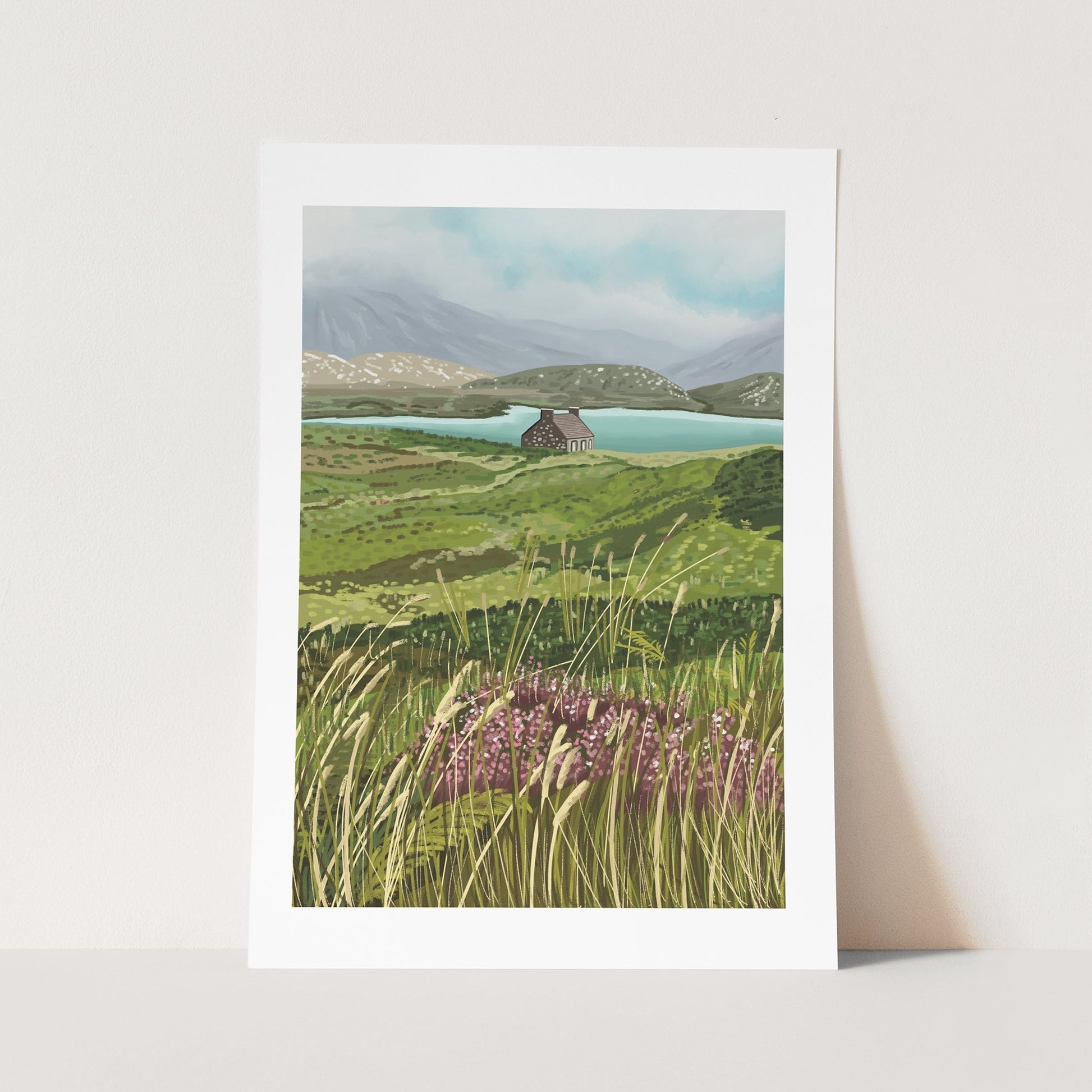 Print of a peaceful bothy nestled in the Scottish highlands from the Pencil Me In stationery shop.