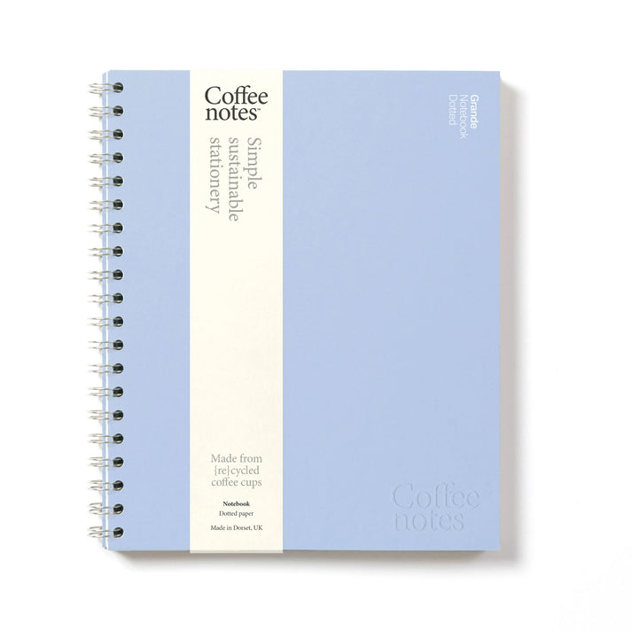 A notebook with light blue cover and dotted paper from the Pencil Me In stationery shop. 