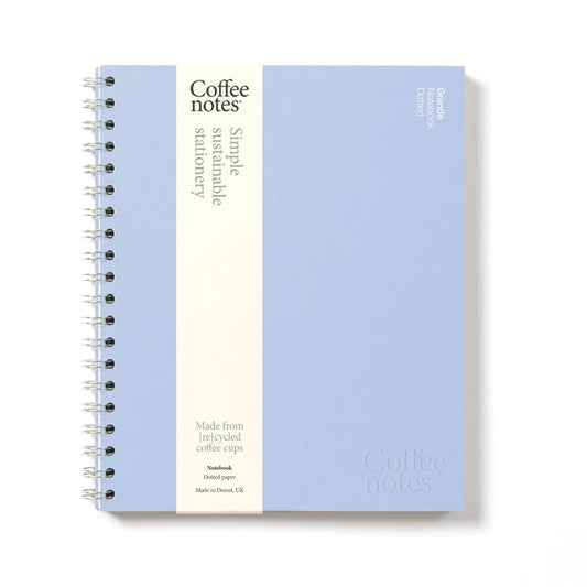 A notebook with light blue cover and dotted paper from the Pencil Me In stationery shop. 