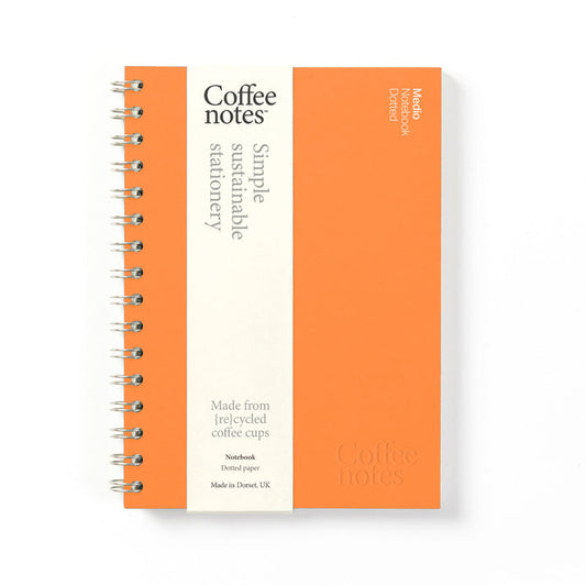 An orange A5 notebook from the Pencil Me In stationery shop. 