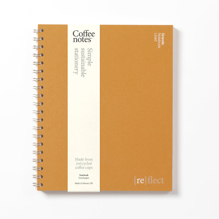 A yellow notebook made from repurposed beer waste from the Pencil Me In stationery shop. 