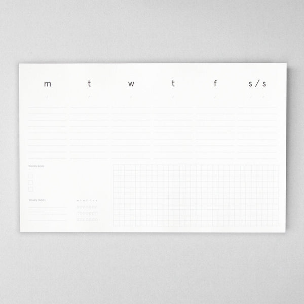 Weekly planner pad from the Pencil Me In stationery shop.